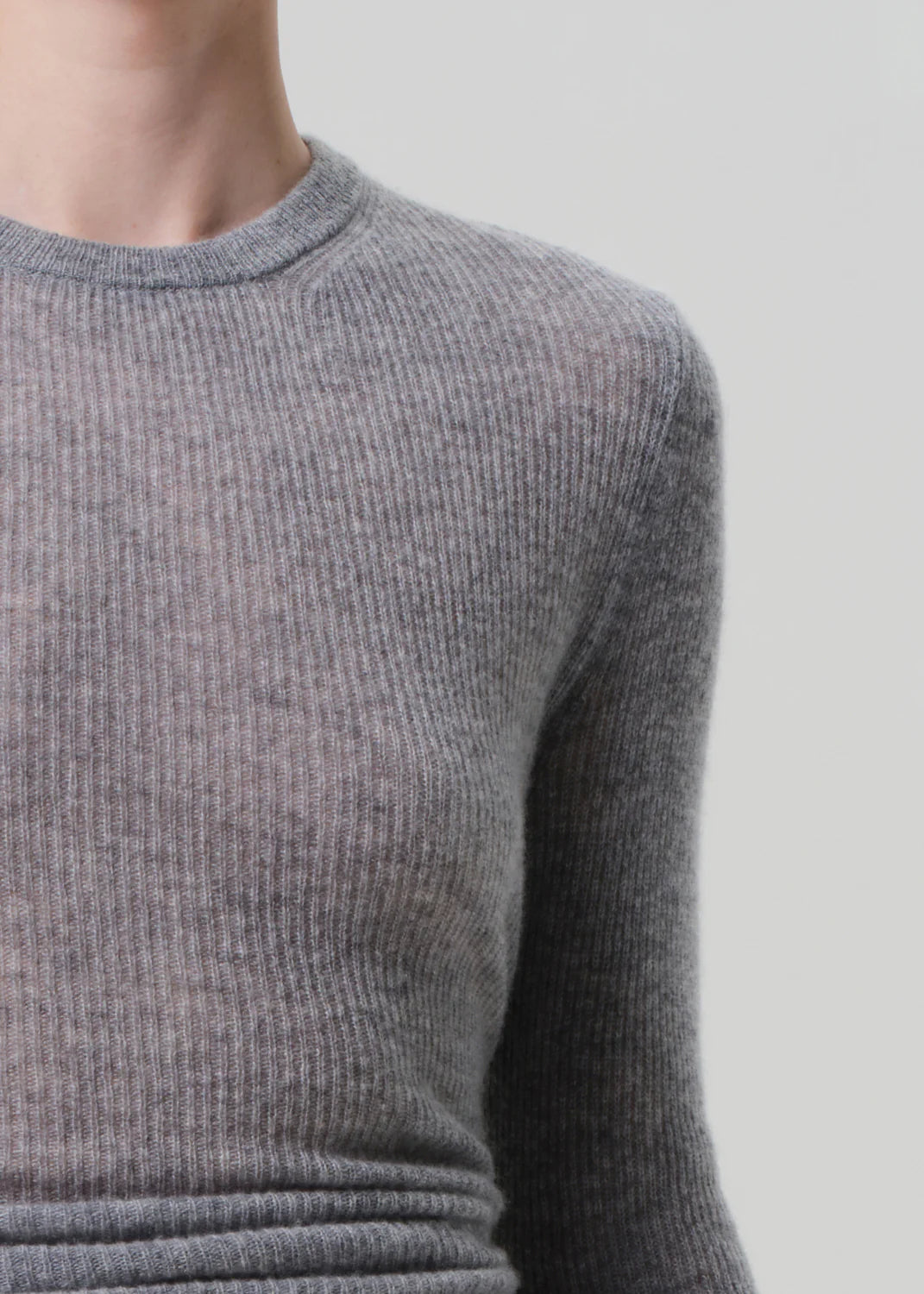 Flat lay of the Alessia Crewneck in Dark Heather Grey, emphasizing its versatile color and design.