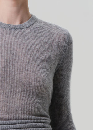 Flat lay of the Alessia Crewneck in Dark Heather Grey, emphasizing its versatile color and design.