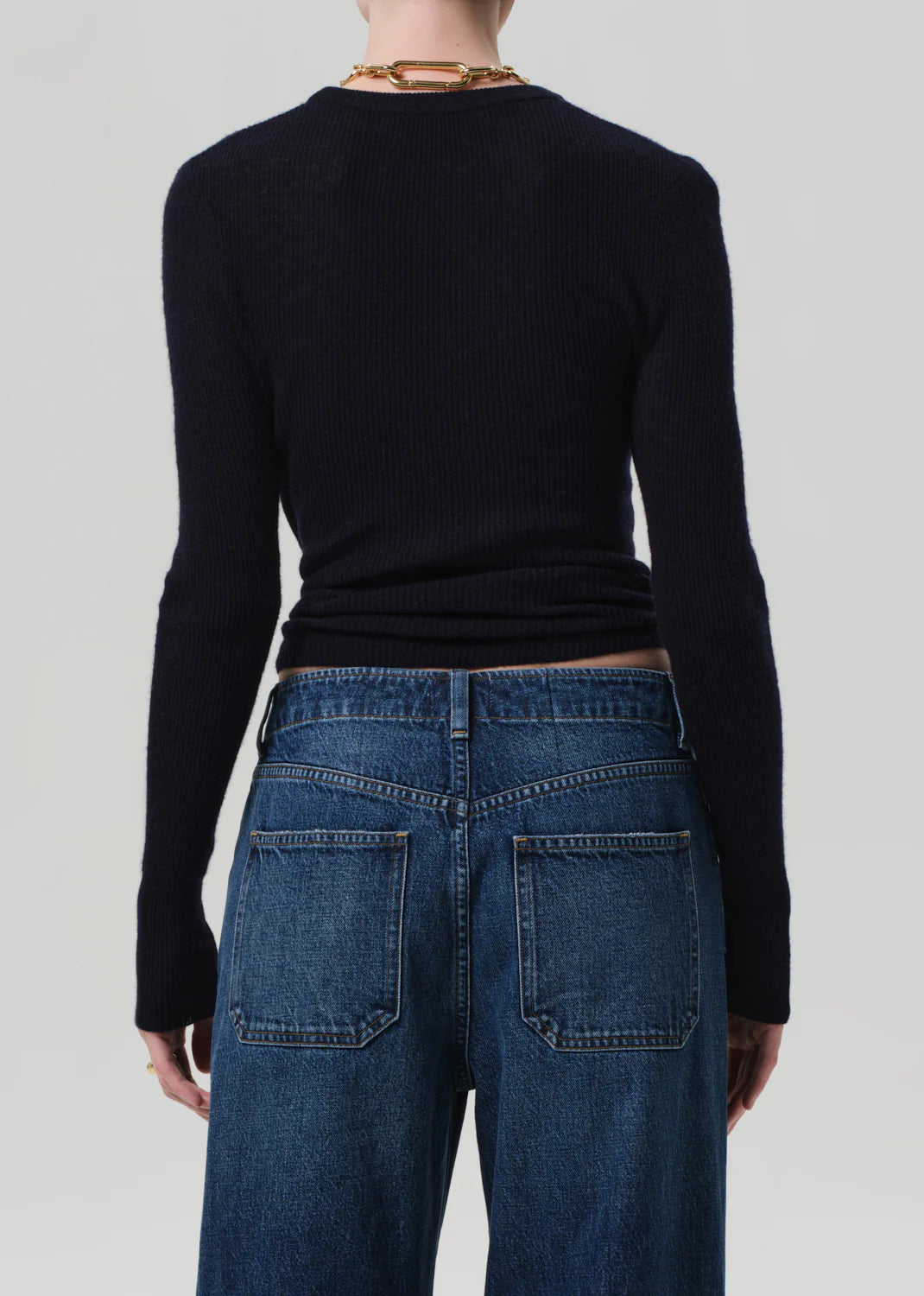 Alessia Crewneck Sweater in Navy laid flat, showcasing its elegant heathered grey hue and luxurious fabric blend.