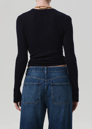 Alessia Crewneck Sweater in Navy laid flat, showcasing its elegant heathered grey hue and luxurious fabric blend.