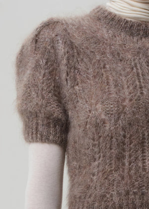 Flat lay of Odette Puff Sleeve Sweater in Mushroom, showcasing the delicate knitwork and its feminine silhouette.