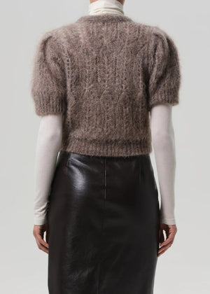 Odette Puff Sleeve Sweater in Mushroom displayed on a hanger, emphasizing its elegant color and design.