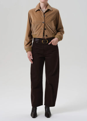 Close-up view of the Lola Eve Bomber in Amber, highlighting the soft texture and pointed collar.