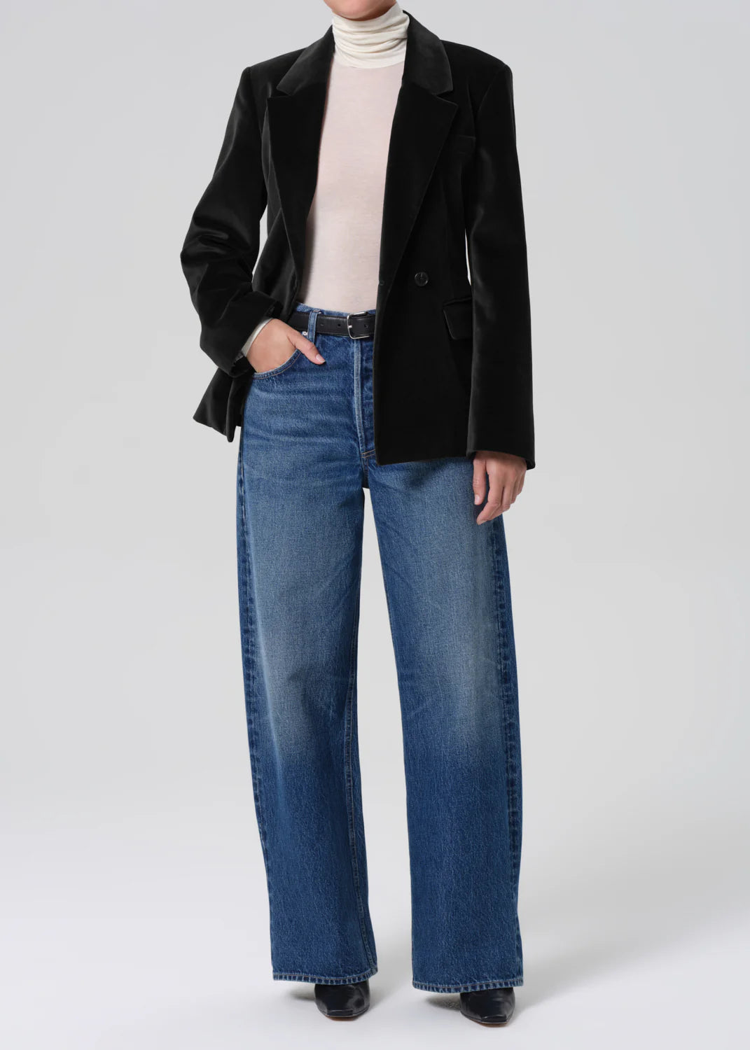 Close-up of the Matteau Velvet Blazer in Black highlighting the ultra-soft polished velvet texture.