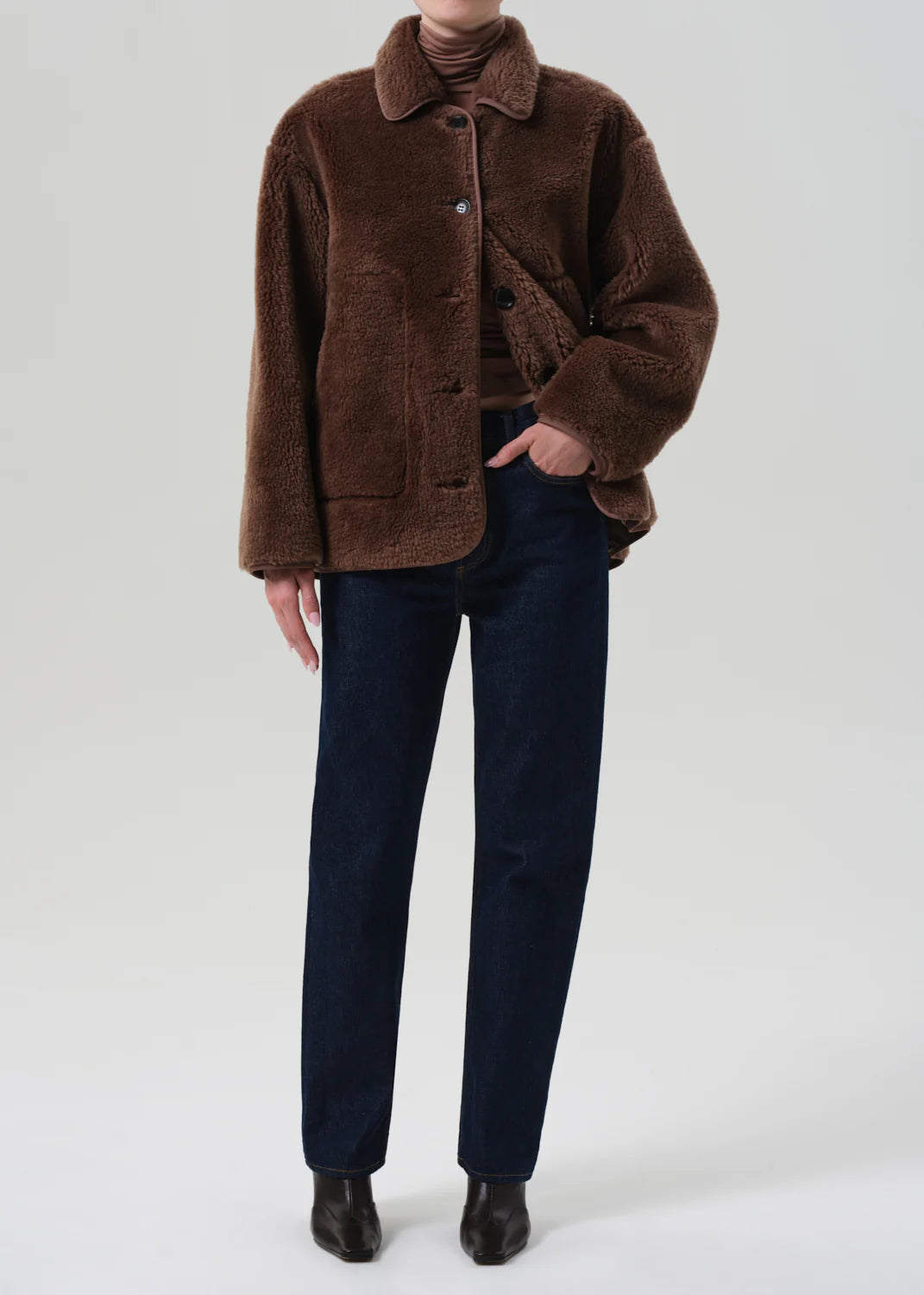 Close-up of the Astrid Sherpa Jacket in Warm Tan, highlighting the soft premium wool texture.