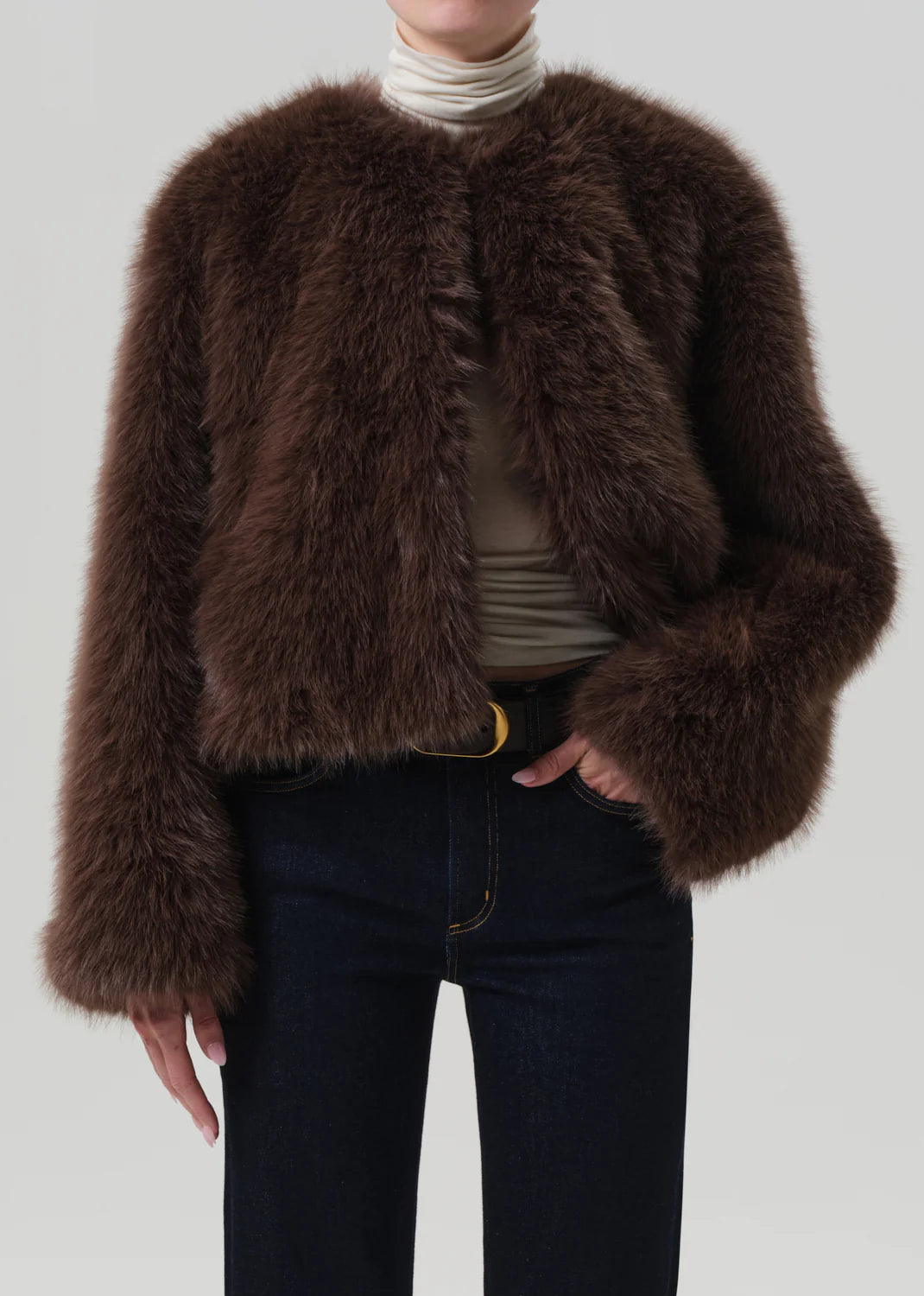 Esme Jacket in Honey - Model wearing the jacket layered over denim for an elevated look.