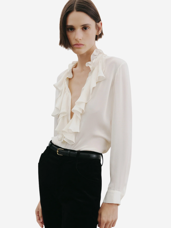 Button cuffs of the Lily Blouse in Ivory, made by Nili Lotan.