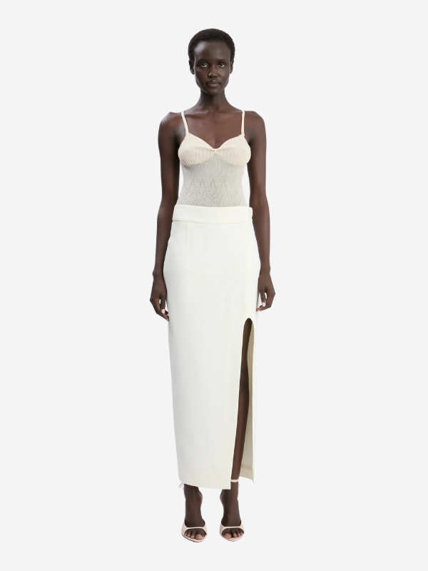 Close-up view of the Split Detail Skirt in Ivory featuring superior twill fabric and elegant dart detailing.