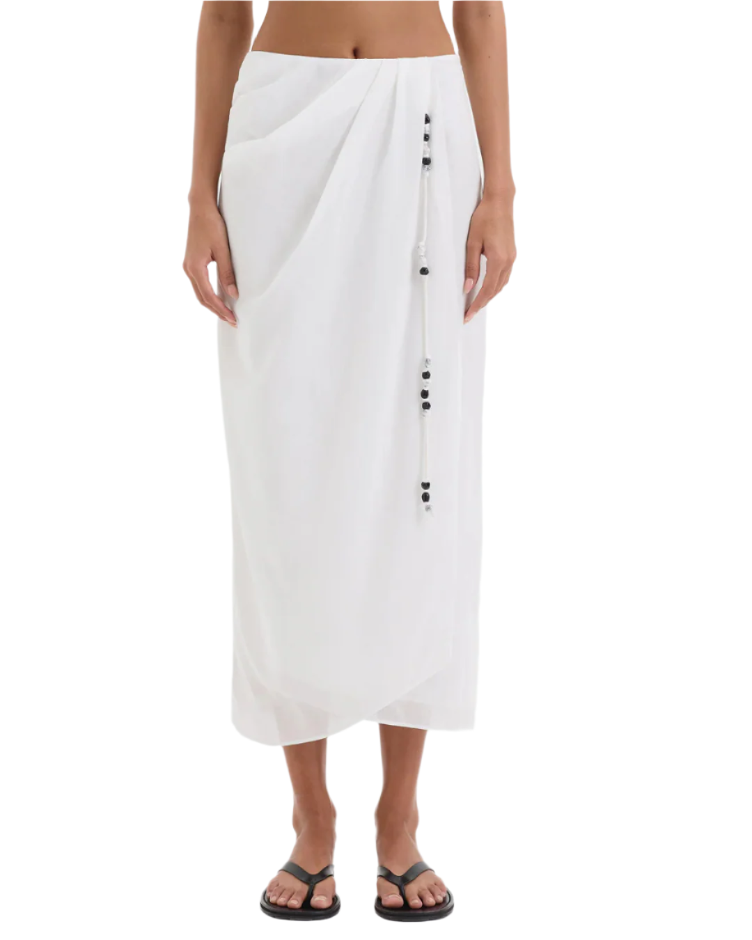 The Azura Midi Skirt in Ivory from SIR, featuring a draped front detail for a trendy look.