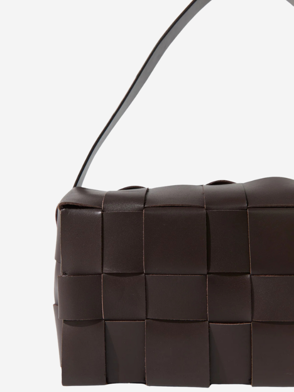 Stylish Woven Envelope Slim Tote in Chocolate styled with casual outfits, perfect for daily essentials.