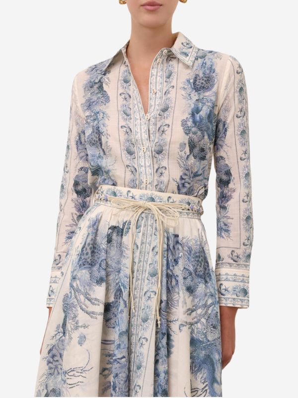 Wanderlust Body Shirt in Blue Toile laid flat, emphasizing its soft cotton texture and stylish print.