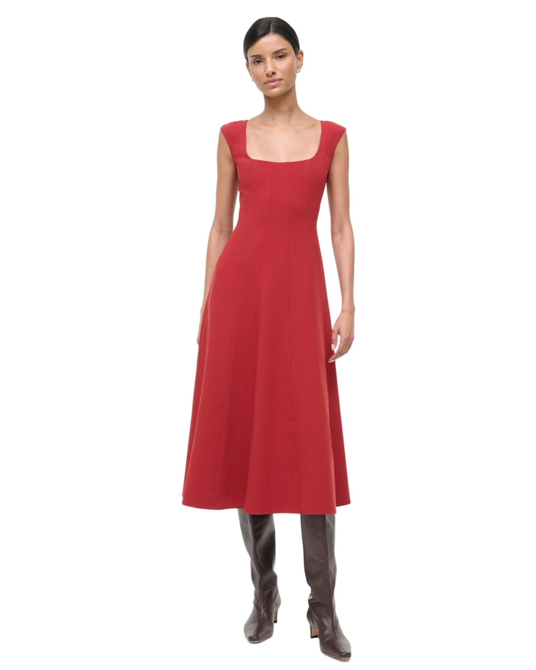 Close-up of the fabric texture of the Charlotte Dress in Rouge by Staud, highlighting its chic design and composition.