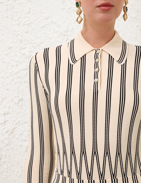 Zimmermann's Rebellion Striped Polo in Cream Stripe displayed on a model in a bright outdoor setting.