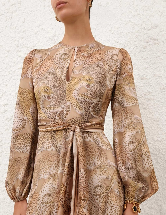 Rebellion Sheath Dress in Latte Leopard showcased on a hanger, emphasizing the luxurious silk fabric and design.