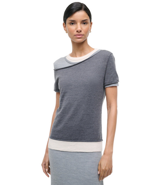 Full view of the Staud Lyric Dress in Heather Grey Multi on a hanger, displaying its unique style and design.