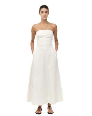 Back view of Sculpted Cotton Strapless Dress in Milk with internal boning for support.