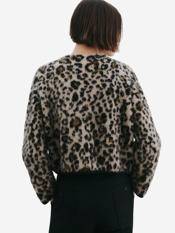Back view of the Beyton Cardigan in Jute Leopard showcasing the clean finish and wrist-length sleeves.