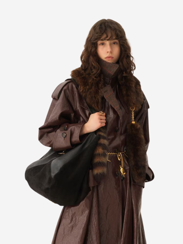 Elegant Chloé Balloon Bag in Black featuring a rounded design and equestrian-inspired details.