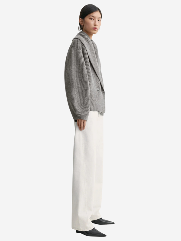 Side view of the Shawl-Lapel Cardigan in Mid Grey Melange highlighting its dramatic rounded proportions.