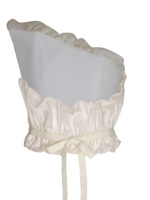 Full outfit view displaying the Auroras in Off White, an eye-catching asymmetrical corset top that enhances any look.