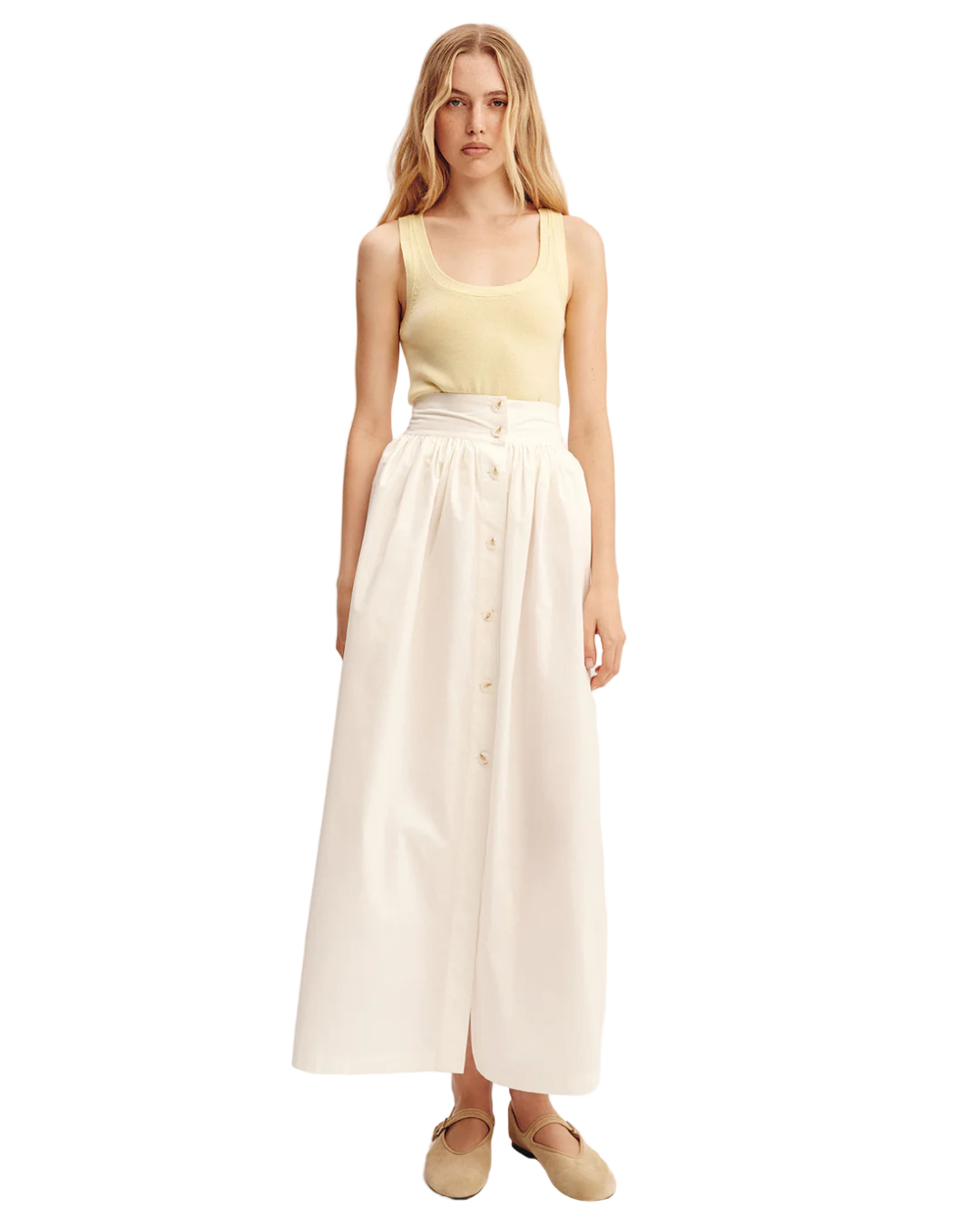 Close-up of Oscar Skirt in Cream - detailed view showcasing the soft fabric of this cream midi skirt.