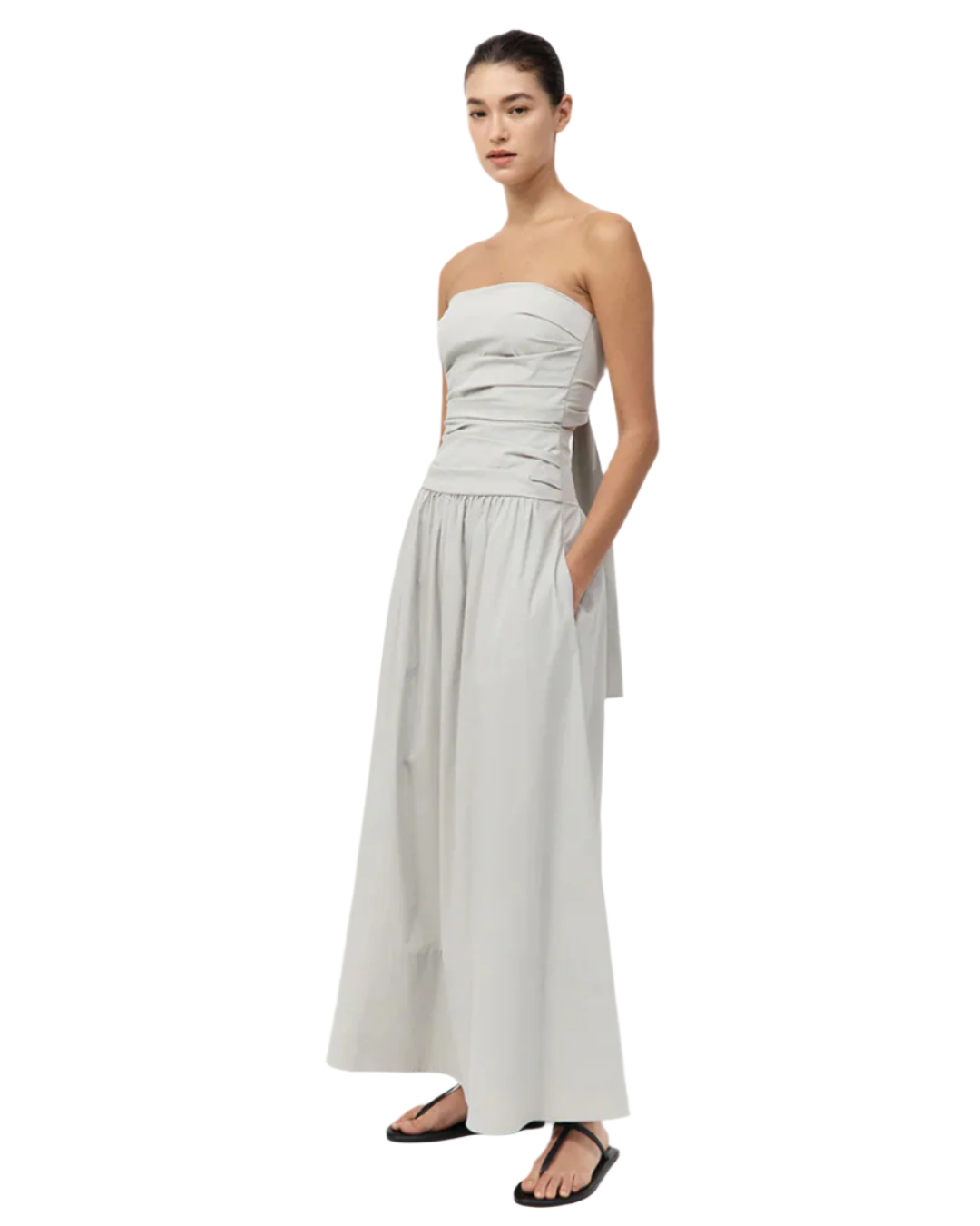 Back view of the Gathered Strapless Tie Back Dress in Silver with striking tie detail, highlighting its elegant form and style. A must-have strapless tie back dress.