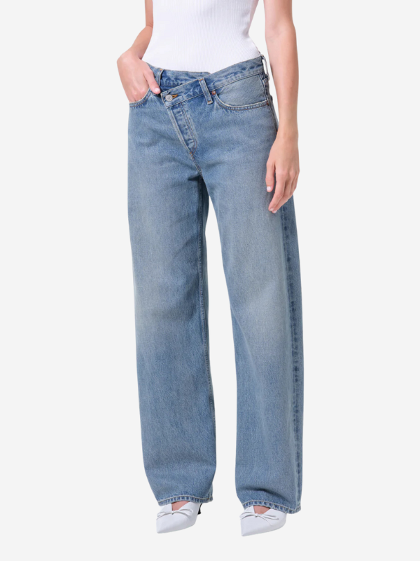 Side angle of Agolde Arc Criss Cross Jean in Conclusion emphasizing the 32” inseam and overall stylish silhouette.