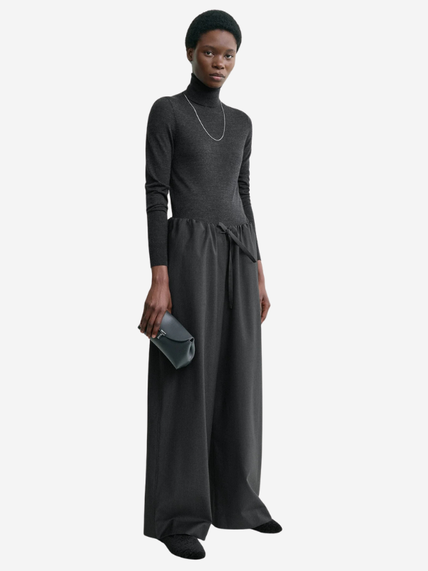 Close up view of the Drawstring Dinner Trouser in Charcoal Melange highlighting the elasticated waistband and wool texture.