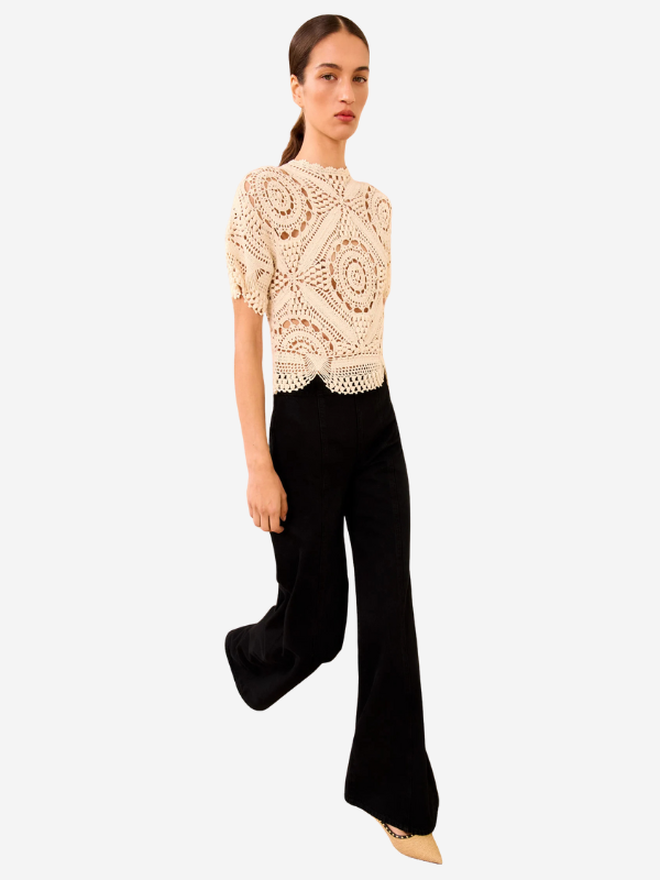 Close-up of the Maddalena Top in Cowrie, highlighting the detailed hand-crocheted patterns in 100% cotton.