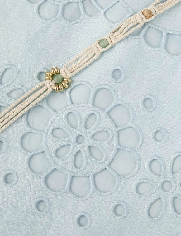 Model wearing the Awaken Embroidered Skirt in Mint, styled with a chic top for a trendy look.