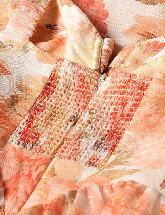 Dress on a hanger, the Rebellion Drape Midi Dress in Golden Bloom highlighting its intricate design details.