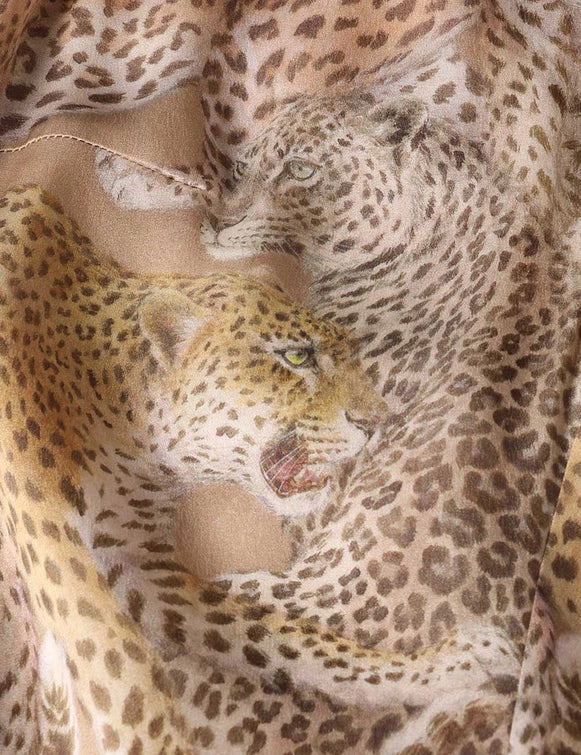 Lifestyle image of Rebellion Sheath Dress in Latte Leopard, perfect for a casual yet chic occasion.