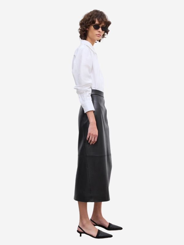 Back view of House of Dagmar leather midi skirt featuring two-way metal zip and smooth lamb leather.