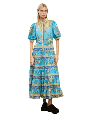 Close-up detail of the self-covered buttons on the Cassie Tiered Midi Dress in Blue, highlighting the elegant design.