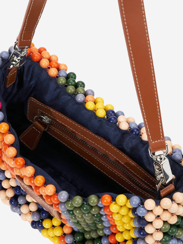 Detail shot of the Staud Timmy Shoulder Bag in Multi Bayadere Stripe emphasizing its unique acrylic bead composition.