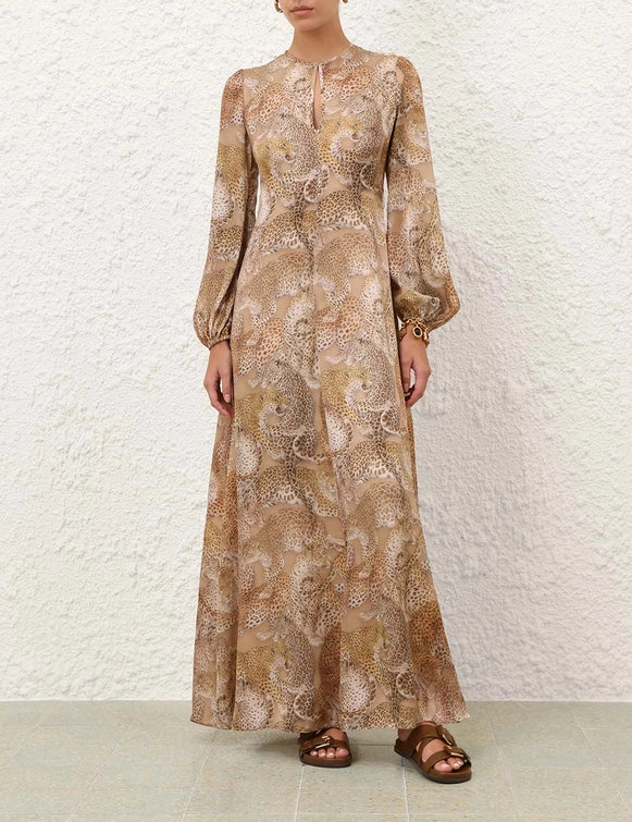 Model wearing Rebellion Sheath Dress in Latte Leopard, styled with elegant accessories for a romantic look.