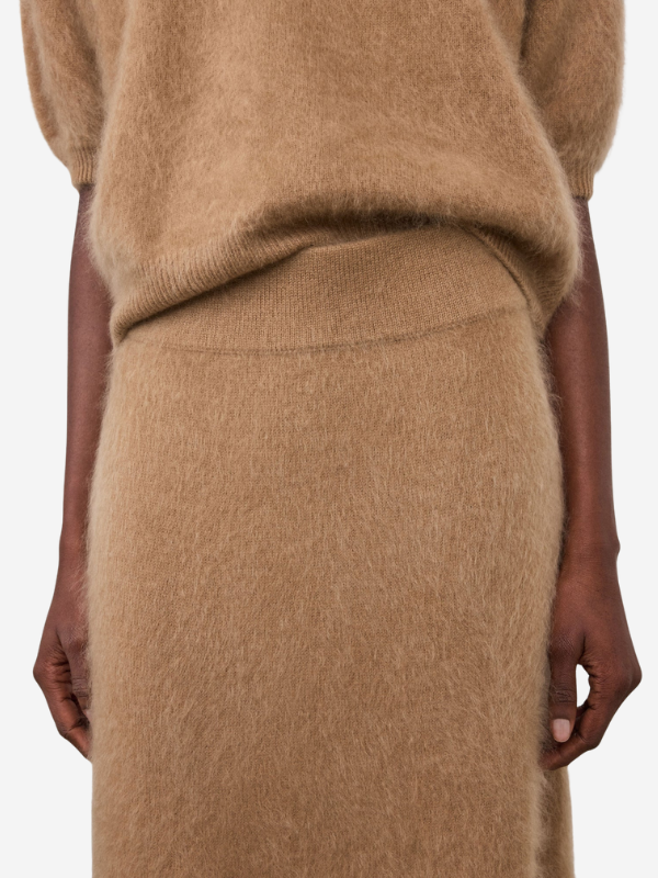 Stylish outfit featuring the Asta Skirt in Toffee paired with casual top, perfect for a chic everyday look.