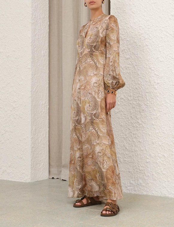 Flat lay of Rebellion Sheath Dress in Latte Leopard displaying the silk texture and stylish patterns.