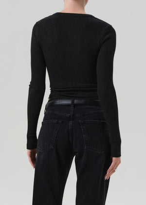 Bina Crewneck in Heather Charcoal displayed on a mannequin, emphasizing its long sleeve silhouette and casual style.