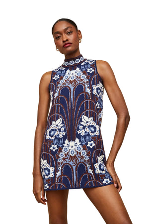 Close-up view of the Ayla Mini Dress in Fontaine Navy, featuring a sleeveless style and center back exposed gold zipper.