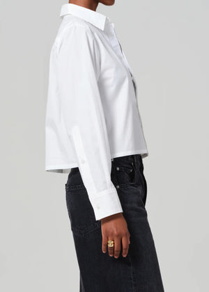 The Fino Boxy Cropped Tuxedo Shirt in White, displayed on a mannequin to illustrate its perfect fit.