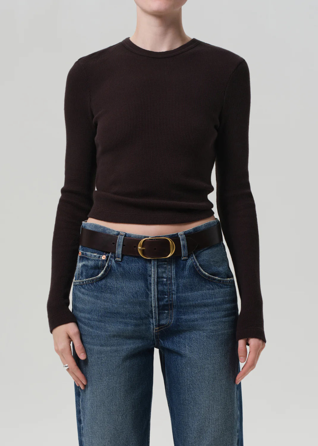 Side view of the Pilar Waffle Crewneck in Chocolate, highlighting the comfortable fit and soft waffle texture.