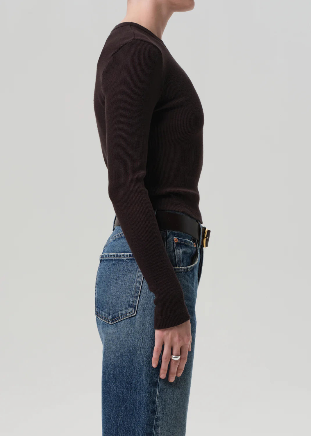 Close-up of the material of the Pilar Waffle Crewneck in Chocolate, featuring a cozy and warm waffle knit fabric.