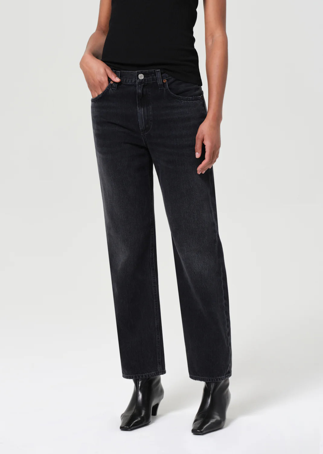 Side view of Valen Jean in Hitch with an ankle-grazing inseam, made from 100% organic cotton.