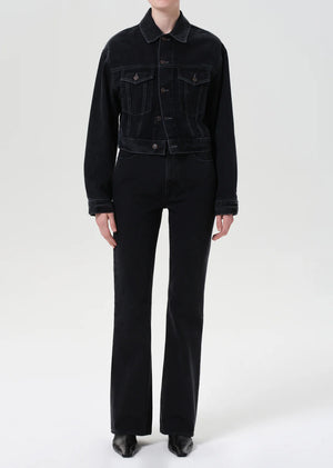 Side view of Agolde's Leena Jean in Forecast, highlighting the elongated leg and subtle fading effects.