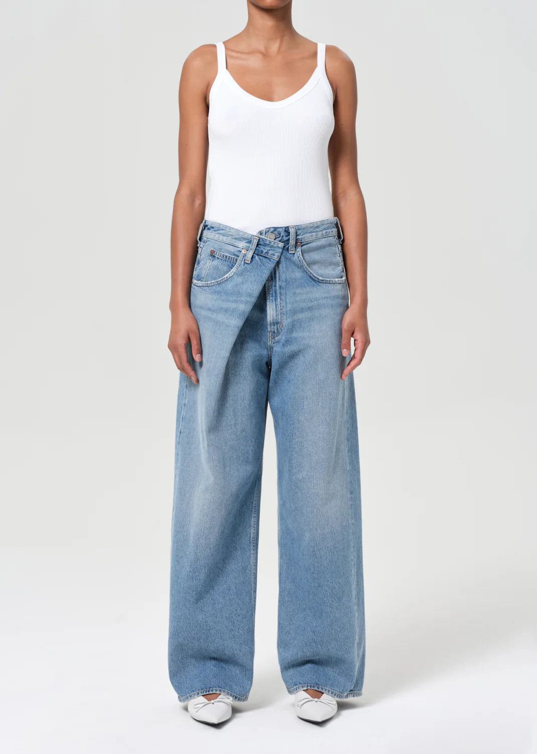 Close-up detail of Agolde's Vana Fold Jean in Mantra, highlighting the regenerative cotton fabric