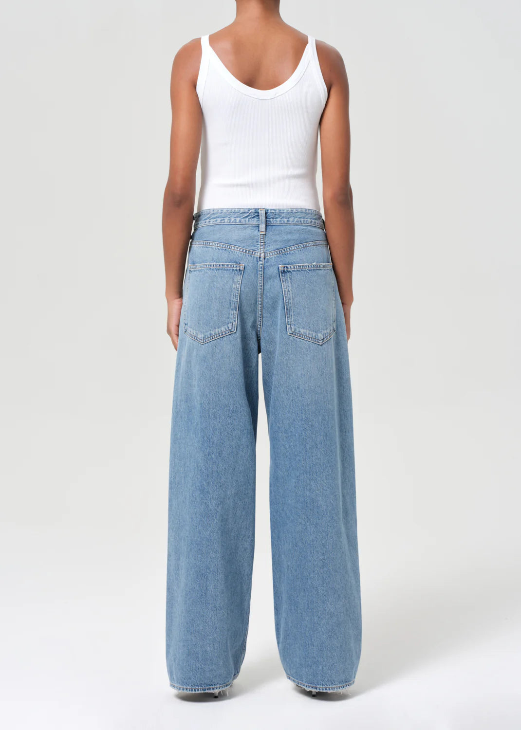 Back view of Agolde Vana Fold Jean in Mantra, emphasizing the roomy leg and low-slung fit
