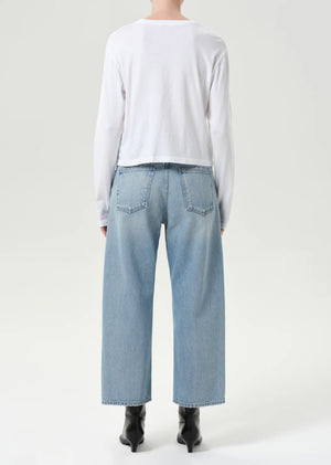 Side view of Agolde Arc Jean in Orten, emphasizing the unique shape and stylish design.