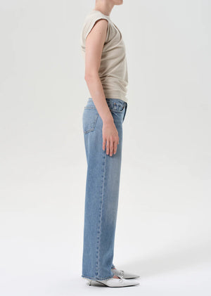 Side view of Agolde's Low Rise Loose Jeans in Vault, featuring non-stretch denim and a laid-back silhouette.
