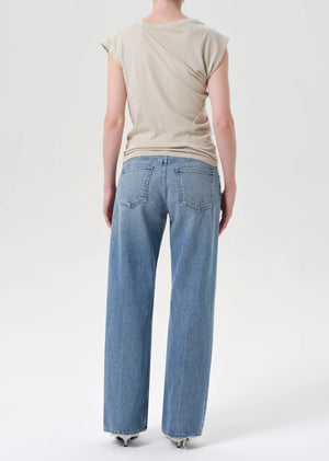 Close-up of the button fly detail on Agolde Low Rise Loose Jeans in Vault, made from 100% regenerative cotton.